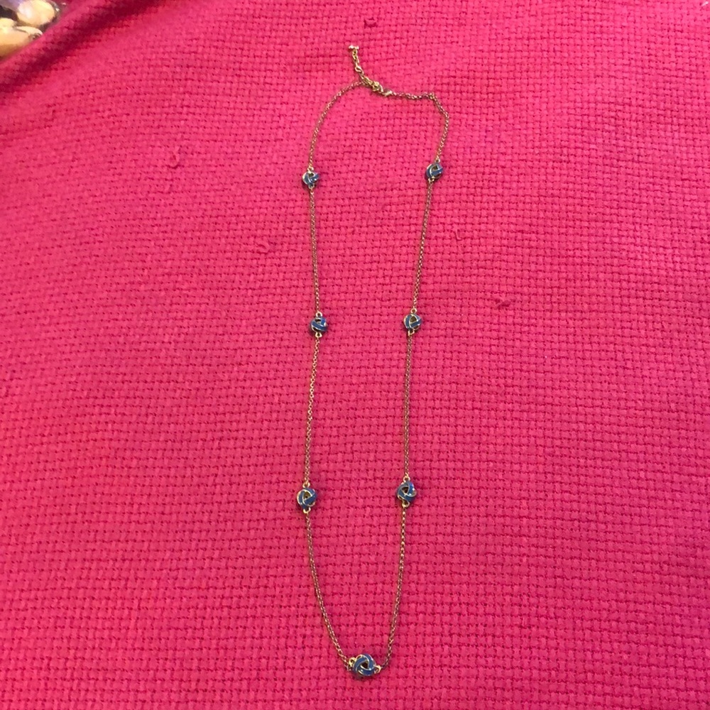 Gold long necklace with blue love knots